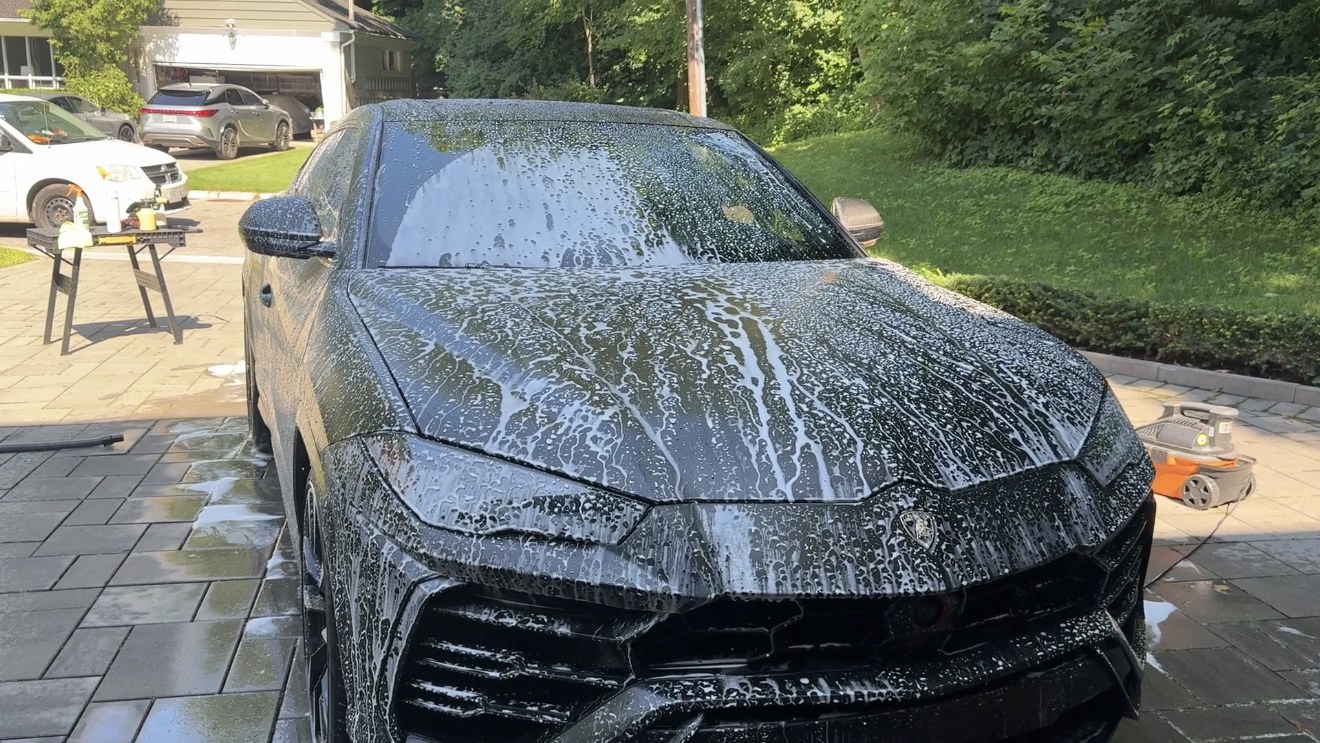 Lamborghini Urus covered in foam during hand wash